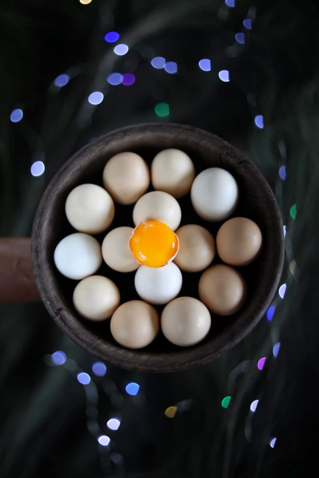 A broken egg in a bowl